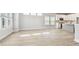 Spacious living room with hardwood floors, natural light, and modern fixtures at 4717 W Mccoy St # 9, Tampa, FL 33616