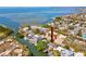 An aerial view of a charming waterfront home with direct access to the bay at 4834 W Flamingo Rd, Tampa, FL 33611