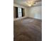 Cozy bedroom featuring neutral carpet and a ceiling fan, perfect for a restful retreat at 4983 Puritan Cir # 524, Tampa, FL 33617