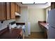 Functional kitchen with laminate countertops and a range, complemented by available appliances at 4983 Puritan Cir # 524, Tampa, FL 33617