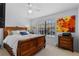 Comfortable bedroom featuring a light blue walls, and a window that brings in natural light at 5100 Burchette Rd # 1606, Tampa, FL 33647