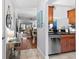 Hallway view showing flow between kitchen, dining, and living areas at 5100 Burchette Rd # 1606, Tampa, FL 33647
