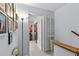 Hallway featuring art décor and access to the bedroom at 5100 Burchette Rd # 1606, Tampa, FL 33647