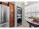 Modern appliances and breakfast nook in a sunlit kitchen area at 5100 Burchette Rd # 1606, Tampa, FL 33647