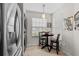 Cozy kitchen nook with a small table, chairs, and bright natural light at 5100 Burchette Rd # 1606, Tampa, FL 33647