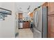 Well-lit kitchen showcasing stainless steel appliances and ample cabinet space at 5100 Burchette Rd # 1606, Tampa, FL 33647