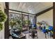 Relaxing screened lanai with comfortable seating, offering a peaceful retreat to enjoy the beautiful outdoor views at 5100 Burchette Rd # 1606, Tampa, FL 33647
