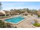 Community pool with lounge chairs, jacuzzi, and a cabana at 5100 Burchette Rd # 1606, Tampa, FL 33647