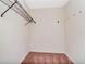 Empty walk-in closet provides ample storage space with carpeted floor at 5101 Estates Cir, Sarasota, FL 34243