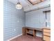Additional room with custom wooden desk and plaid wallpaper at 5101 Estates Cir, Sarasota, FL 34243
