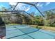 The outdoor screened pool offers an inviting space for relaxation and recreation at 5101 Estates Cir, Sarasota, FL 34243