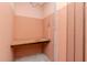 A small storage room with a convenient built-in worktable offers practical space for various activities at 5101 Estates Cir, Sarasota, FL 34243
