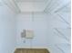 A walk-in closet with wire shelving and carpeted flooring provides ample storage space at 6262 Timberly Ln # 99, Zephyrhills, FL 33542