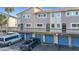 Townhome features a private garage and outdoor access to living space at 6317 Newtown Cir # 17B2, Tampa, FL 33615