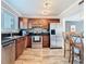 Updated kitchen features stainless steel appliances and granite countertops at 6317 Newtown Cir # 17B2, Tampa, FL 33615
