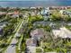 Aerial view of a neighborhood with waterfront homes, canals, and lush landscaping at 6467 Rubia Cir, Apollo Beach, FL 33572