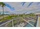 Elevated angle displaying the pool and deck area with water views, and surrounding community at 6467 Rubia Cir, Apollo Beach, FL 33572