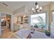 Relaxing bathroom with a garden tub, granite counters, and tranquil views at 6467 Rubia Cir, Apollo Beach, FL 33572