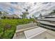 Dock featuring boat, boat lift and seating at 6467 Rubia Cir, Apollo Beach, FL 33572