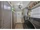 Convenient laundry room with modern washer, dryer, and storage, offering functionality and efficiency at 6467 Rubia Cir, Apollo Beach, FL 33572