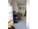 Carpeted secondary bedroom featuring natural light, neutral paint and closet at 6513 Sand Shore Ln, New Port Richey, FL 34652