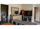 Bedroom featuring a television, shelving unit, dresser, and a mirror above the dresser at 6513 Sand Shore Ln, New Port Richey, FL 34652