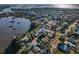 Aerial view of the house and property, showing its location near the water at 7 Georgia Ave, Crystal Beach, FL 34681