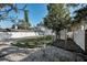 Spacious backyard featuring lush lawn and white fencing, providing privacy at 7 Georgia Ave, Crystal Beach, FL 34681