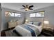 Cozy bedroom with large windows, soft lighting, and modern decor at 7 Georgia Ave, Crystal Beach, FL 34681