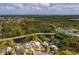 This aerial view shows the home and its location with convenient access to nearby lakes at 8001 Orient Ne Way, St Petersburg, FL 33702