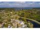 A high aerial shot of the property highlighting the unique multi-building layout of the home at 8001 Orient Ne Way, St Petersburg, FL 33702