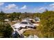 A high aerial shot of the property highlighting the unique multi-building layout of the home at 8001 Orient Ne Way, St Petersburg, FL 33702
