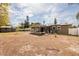 Spacious backyard featuring a shed, screened in patio, and plenty of greenery at 8001 Orient Ne Way, St Petersburg, FL 33702