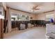 Spacious bedroom showcasing neutral walls, light flooring, and large windows offering views at 8001 Orient Ne Way, St Petersburg, FL 33702