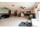 Expansive open-concept living room featuring tile flooring, ample space, and bright natural light at 8001 Orient Ne Way, St Petersburg, FL 33702