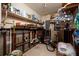 Storage room with open shelving and exposed pipes, offers functionality and utility at 8001 Orient Ne Way, St Petersburg, FL 33702