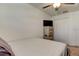 Bedroom features neutral walls, ceiling fan, and a closet; a comfy retreat at 8294 Corner Pine Way, New Port Richey, FL 34655