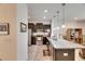 Modern kitchen featuring dark cabinets, granite countertops, and stainless steel appliances at 8421 Pine River Rd, Tampa, FL 33637