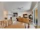 Bright open floor plan showcasing living room, dining area, and modern kitchen at 8421 Pine River Rd, Tampa, FL 33637