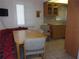 Quaint breakfast nook with neutral decor and convenient access to kitchen at 8525 111Th St # 210, Seminole, FL 33772