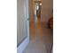 Hallway featuring easy access to main areas of the home and natural light at 8525 111Th St # 210, Seminole, FL 33772