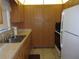 Functional kitchen with plenty of cabinet space and essential appliances at 8525 111Th St # 210, Seminole, FL 33772