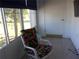 Relaxing lanai with comfortable seating and views of the lush surroundings at 8525 111Th St # 210, Seminole, FL 33772