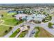 A beautiful community featuring a pool, tennis courts, a community center, and lovely homes at 8887 Little Bluestem Dr, Land O Lakes, FL 34637