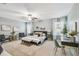 Spacious bedroom featuring neutral colors, plush carpet, and comfortable furnishings at 8887 Little Bluestem Dr, Land O Lakes, FL 34637