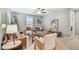 Upstairs living room showcasing comfortable seating, neutral decor, and bright natural light at 8887 Little Bluestem Dr, Land O Lakes, FL 34637