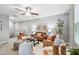 Upstairs living area boasts comfortable seating, neutral decor, and a relaxing atmosphere at 8887 Little Bluestem Dr, Land O Lakes, FL 34637