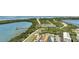 Aerial shot featuring a waterfront property close to nature, docks, and recreational areas at 9 Haig Pl # 310, Dunedin, FL 34698