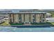Waterfront condo building with balconies showcasing waterfront views and easy water access at 9 Haig Pl # 310, Dunedin, FL 34698