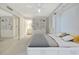 Serene main bedroom with ample storage and modern design, leading into the en-suite bath at 9 Haig Pl # 310, Dunedin, FL 34698